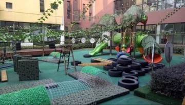 用偽裝網(wǎng)裝飾幼兒園的滑滑梯,孩子們很喜歡 用偽裝網(wǎng)裝飾幼兒園的滑滑梯,孩子們很喜歡